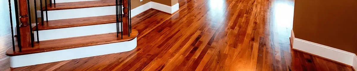 Base floor of a staircase with professionally restored wood flooring in Columbus OH