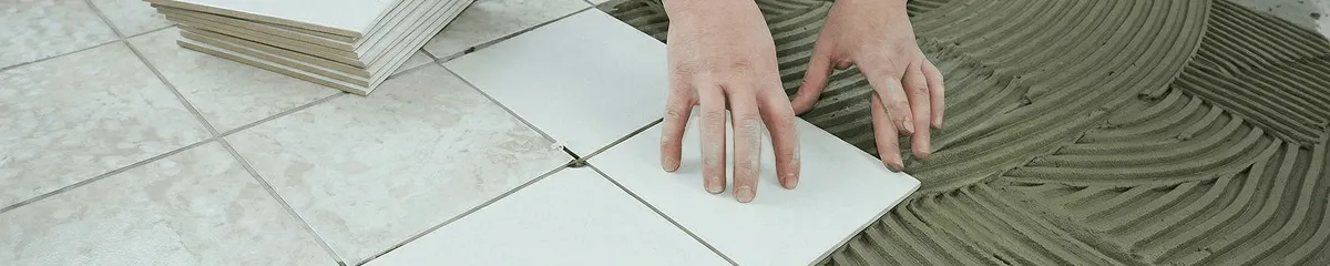 Professional installing white tile floors in Columbus, OH