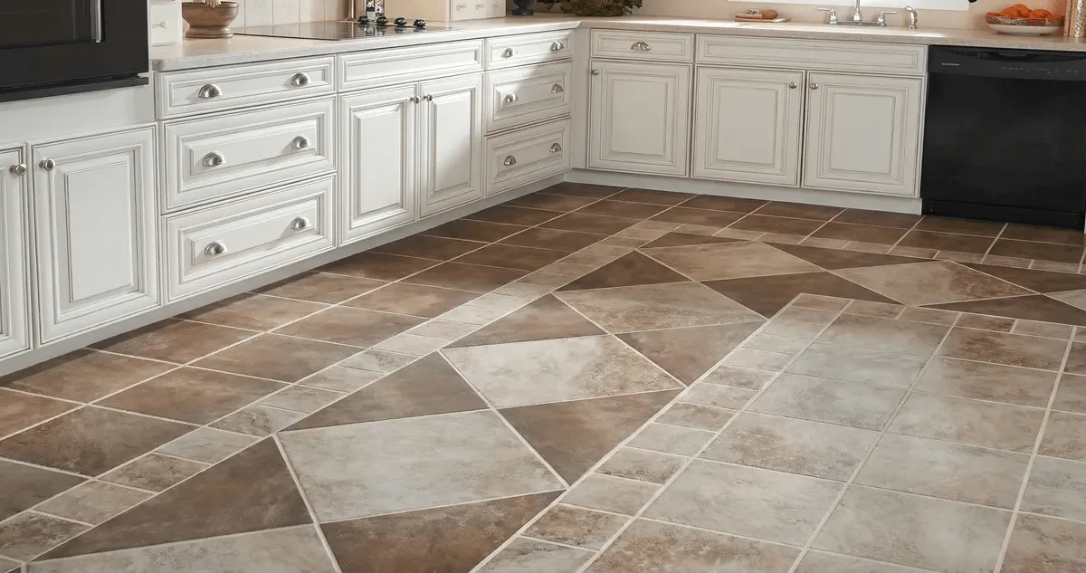 Kitchen with white cabinets and a professionally installed tile floor in Columbus, OH